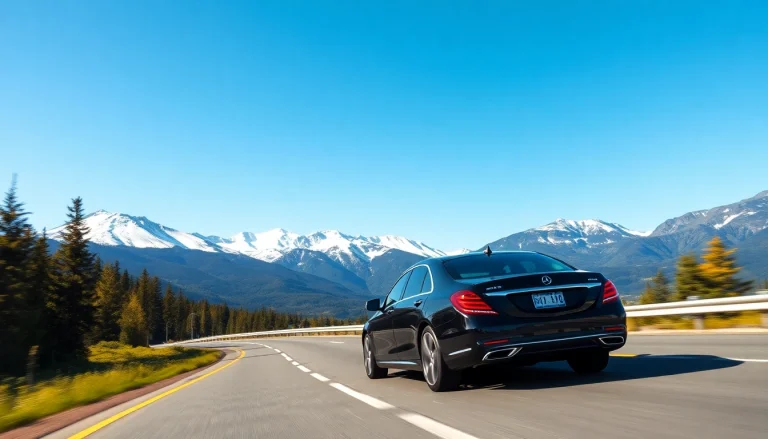 Experience YVR to Whistler car service featuring a luxurious sedan on a mountain road.